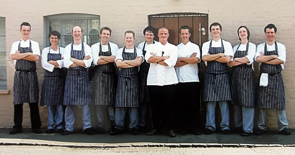 Heston Blumenthal with The Fat Duck’s early kitchen brigade, standing outside the restaurant.